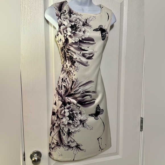 Dolce & Gabbana Dresses & Skirts - Dolce & Gabbana Ivory Silk Dress Black floral & butterfly motif. Authentic.